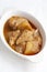 Massaman chicken curry in white bowl