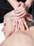 Masseur\'s hands doing deep tissue massage