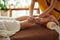 Masseuse Massaging Calves of Client