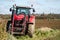 Massey Ferguson parked up with tractor drilling in background