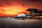 A massive aircraft rests on the concrete at the airport, ready for its next journey, Airport terminal with planes taking off in