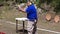 Massive body Man fires handgun during practice training in practical shooting