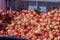 Massive boxes full of freshly harvested cherries being sold at a local market