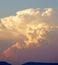 Massive build-up of cumulonimbus clouds over Yuma, Arizona at sunset