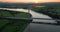 The massive cable-stayed bridge over the Suir River against the sunset 4k