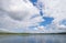 Massive Cloud Banks Over a Wilderness Lake