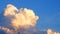 Massive clouds - Cumulus congestus or towering cumulus - move slowly across the sky, beautifully illuminated by the