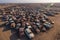massive dump of cars, creating a surreal and haunting landscape of rusted metal and broken parts. Generative AI