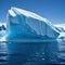 massive floating iceberg in the with visible tip above the water and a