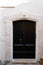 Massive historic high house wooden door entrance black dark classic big wood home gate