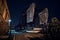 Massive industrial Bascule railroad train bridge at night.