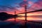 Massive long Golden Gate bridge, San Francisco at sunset