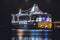 Massive passenger ferry tourist cruise boat in port, night view, sailing in Baltic sea, Helsinki, Finland