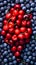 A massive pile of blueberries and a massive pile of cherries. Generative AI