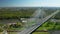 Massive pylon bridge spanning Oder river flowing by Wroclaw