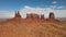 Massive Rock Formation in Monument Valley Desert