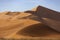 The massive sand dunes in the Namibian desert.