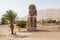 A massive statue of Amenhotep III on the west bank of the Nile, Luxor, Egypt