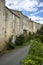 The massive walls of historic homes in Tournon d`Agenais