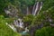 Massive waterfalls among lush foliage