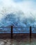 Massive wave breaking at Seapoint promenade in Cape Town South Africa