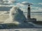 Massive wave crashes into the lighthouse