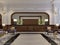 Massive wooden reception desk in the elegant interior of a luxury hotel