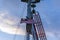 Mast of a construction work barge with Malaysia flag