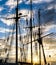 Mast and rope sailboat vessel on sky sunset background