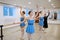 Master and ballerinas, exercise at barre in class