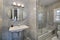 Master bath with gray tile