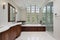 Master bath with wood cabinetry