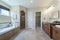 Master bathroom interior with antiqued limestone tiles