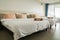 Master bedroom in hotel with two double beds for family trip