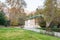 Master Behzad Museum hidden in the golden forest in autumn with background of mountain in Sa`dabad palace Complex, built by the