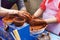 Master ceramist teaches student.Master ceramist teaches student. Craftsman hands making pottery bowl. Woman working on potter