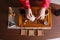 Master conducting traditional tea ceremony at wooden table, top view