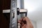 The master installs the door handle with the help of a sprocket key, installation works with the door.