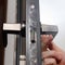 The master installs the door handle with the help of a sprocket key, installation works with the door.