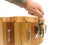 Master making new wooden snare drum isolated