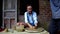 Master shows joyful girl makes clay pot at lesson in shop