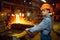 Master steelmaker at furnace, steel factory