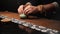 Master of tea ceremonies puts a container with incense