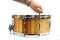 Master tuning new wooden snare drum isolated