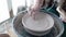 A master at work in a pottery workshop