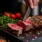 Masterful cut Chef skillfully slices through a substantial beef piece