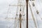 Masting of big wooden sailing ship, detailed rigging