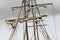 Masting of big wooden sailing ship, detailed rigging with sails