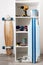 Mastrekskoy interior for mending skateboards and longborods. White cabinet with tools.