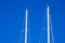 Masts of Sailboats Against a Blue Sky